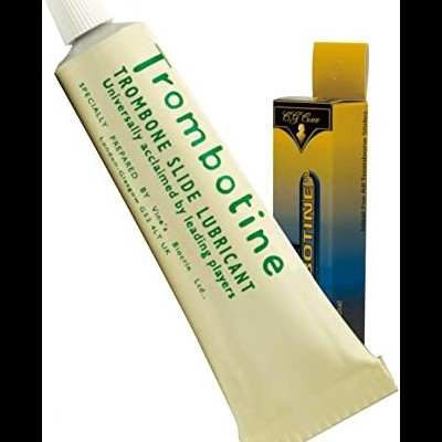 Imagem de um tubo de lubrificante para trombone e sua caixa colorida