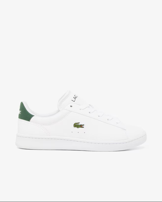 Sapatilha Lacoste Carnaby Set jr Ténis branco com logótipo de crocodilo verde e detalhes verdes