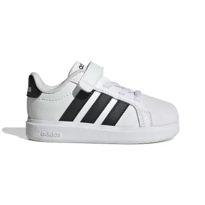 Sapatilha desportiva branca com riscas pretas e velcro