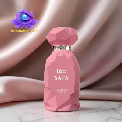 Frasco de perfume rosa facetado com texto SAFA e ARABIYAT PRESTIGE