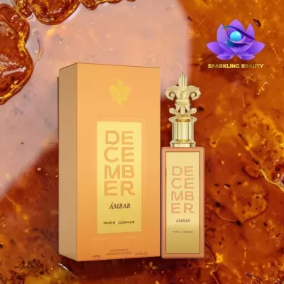 Perfume December Âmbar com caixa sobre fundo âmbar