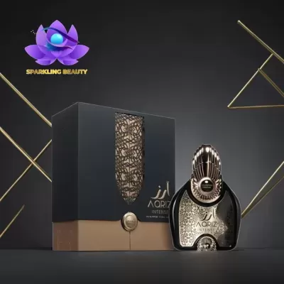 Frasco de perfume e caixa preta e castanha com detalhes dourados