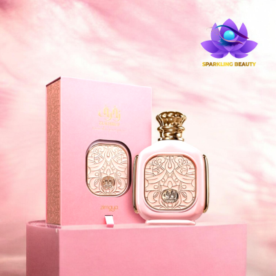 Frasco e caixa de perfume rosa com detalhes dourados e logótipo SPARKLING BEAUTY