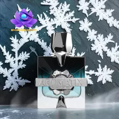 Frasco de perfume AROMATIX em vidro azul e preto com detalhes prateados e decoração de flocos de neve brancos.