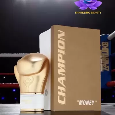 Frasco de perfume em forma de luva de boxe dourada com caixa castanha e letras CHAMPION 