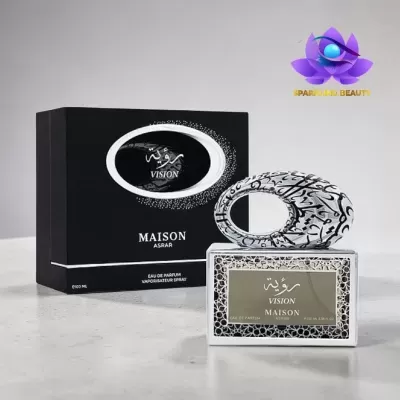 Frasco de perfume com tampa oval decorada e caixa preta com texto Vision Maison Asrar