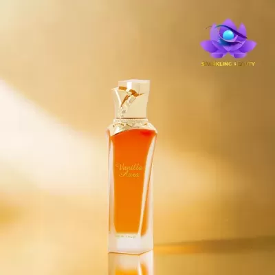 Frasco de perfume Vanilla Aura com tampa dourada sobre fundo dourado