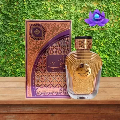 Frasco dourado de perfume Watani com caixa decorativa ao lado