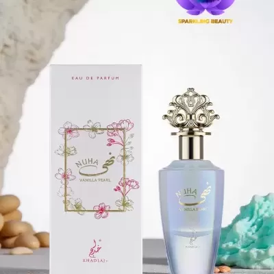 Perfume Nuha Vanilla Pearl com embalagem branca decorada e tampa dourada.