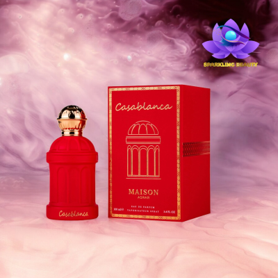 Frasco de perfume vermelho e caixa vermelha com texto em dourado Casablanca Maison Asrar