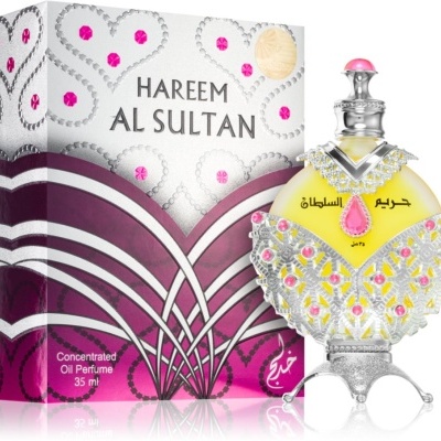 Frasco decorativo de perfume concentrado ao lado da caixa com texto Hareem Al Sultan
