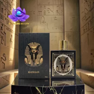 Frasco e caixa de perfume RAYHAAN com tema faraó egípcio em fundo com hieróglifos