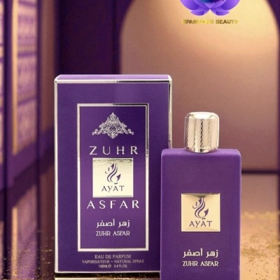 Frasco e caixa de perfume roxos Zuhr Asfar AYAT com texto dourado e árabe