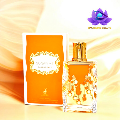 Frasco de perfume laranja com tampa dourada junto a caixa com detalhes dourados e texto