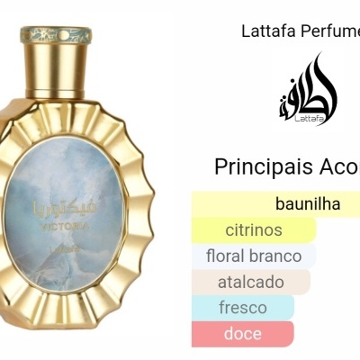 Frasco dourado de perfume Lattafa Victory com vidro azul e descrição dos acordes