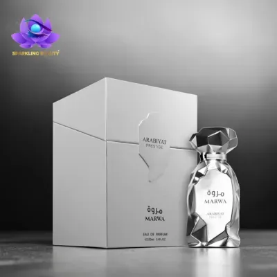 Frasco de perfume prateado facetado com caixa branca ao lado