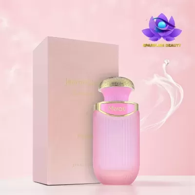 Frasco de perfume rosa com tampa dourada e caixa rosa com texto dourado