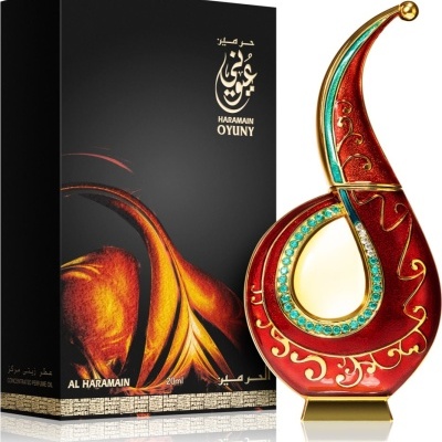 Frasco de perfume vermelho decorado e embalagem preta com texto