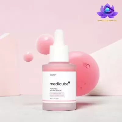Frasco de vidro rosa fosco com serum, tampa branca e conta-gotas