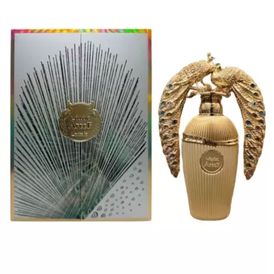 Frasco de perfume dourado decorado com asas em forma de pavões e embalagem prateada