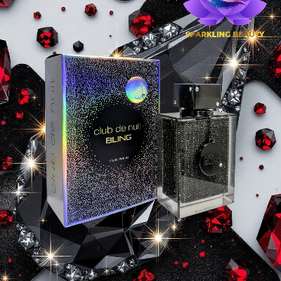 Frasco preto de perfume Club de Nuit BLING com embalagem holográfica e fundo decorado com gemas vermelhas e pretas.