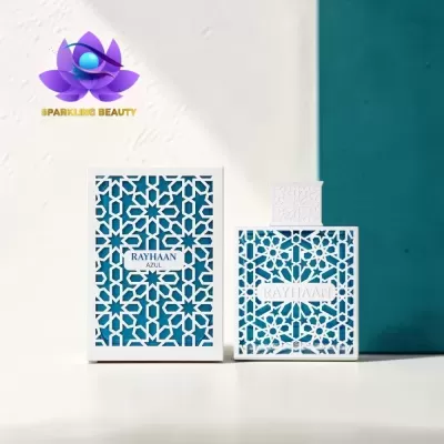 Perfume Rayhaan Azul com padrão geométrico branco sobre azul