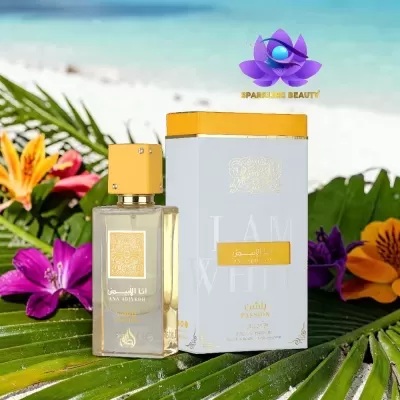 Frasco e caixa de perfume ANA ABIYEDH PASSION sobre folhas e flores tropicais