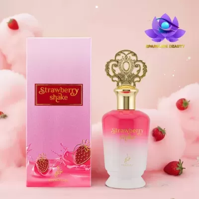 Frasco de perfume rosa e branco com tampa dourada e caixa rosa com ilustrações de morangos