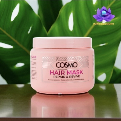 Máscara capilar COSMO Hair Mask Repair & Revive rosa com folhas verdes ao fundo