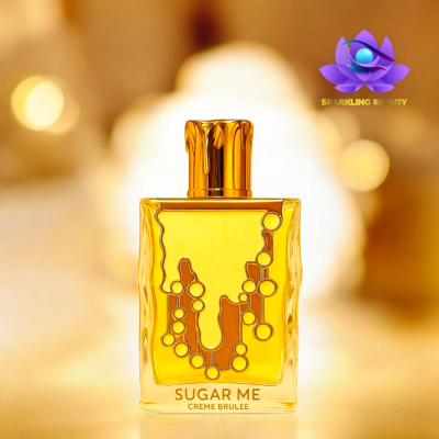 Frasco de perfume amarelo transparente com tampa dourada e padrão circular