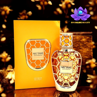 Frasco de perfume NECTARE extradose com padrão hexagonal dourado e embalagem laranja