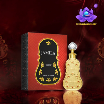 Frasco dourado decorado com óleo perfumado ao lado de caixa vermelha e preta Jamila Swiss Arabian