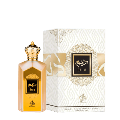 Frasco de perfume dourado com tampa e etiqueta preta e caixa decorada