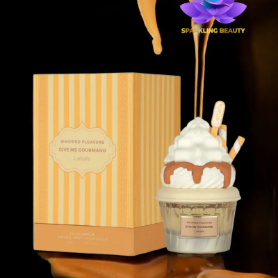 Perfume Lattafa Give Me Gourmand com embalagem riscada amarela e creme e frasco decorado