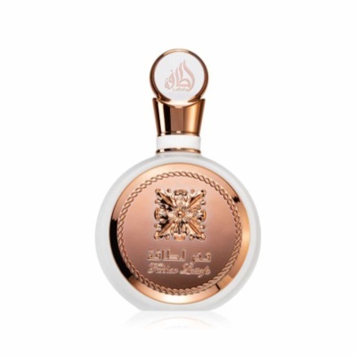 Frasco de perfume branco e rosa dourado com texto árabe e decoração