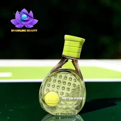 Frasco de perfume ARMAF MATCH POINT com tampa amarela sobre superfície verde