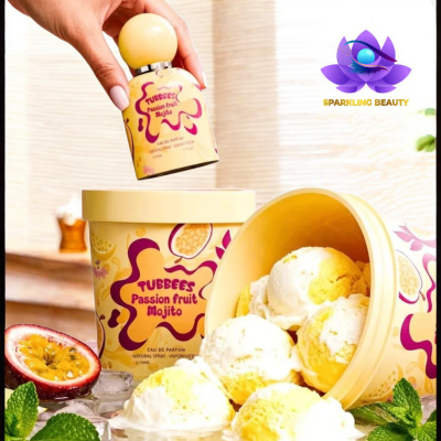 Frasco e embalagem de perfume Tubbees Passion fruit Mojito junto a bolas de gelado amarelas e brancas e folhas verdes.