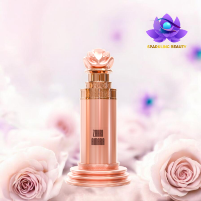 Frasco de perfume rose gold com tampa em forma de flor e texto ZAHRI AMARA no centro