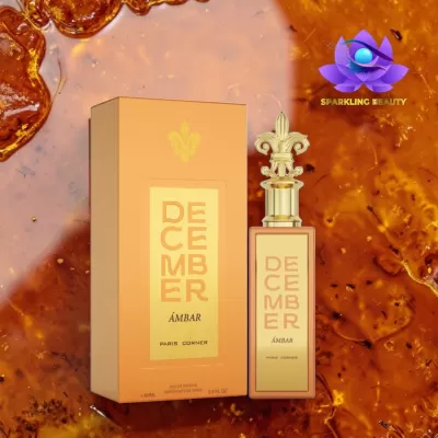 Perfume December Âmbar com caixa sobre fundo âmbar
