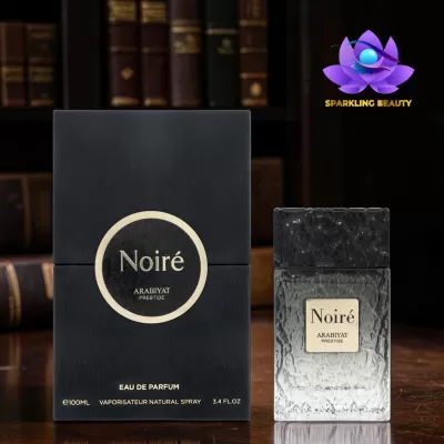 Frasco e embalagem de perfume Noiré ARABIYAT PRESTIGE em caixa preta ao lado do frasco transparente com tampa preta