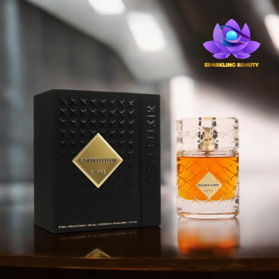 Frasco e caixa preta do perfume GOLDEN ELIXIR sobre mesa