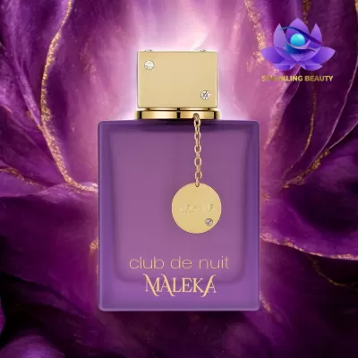 Frasco roxo fosco de perfume com tampa dourada e texto club de nuit MALEKA