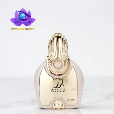 Frasco de perfume AQRIZ dourado e bege com tampa ornamentada