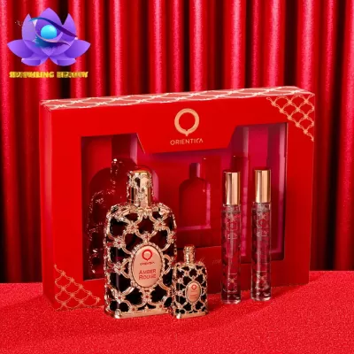 Conjunto de perfume Oriental Amber Rouge com frascos decorados e caixa vermelha