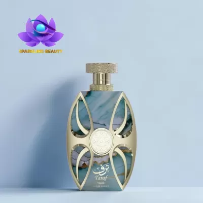 Frasco de perfume azul e dourado com texto Taraf VERDE EAU DE PARFUM