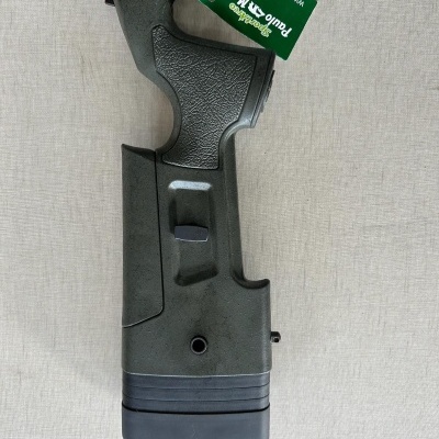 Coronha verde escuro com textura preta antiderrapante e etiqueta verde com texto Branco Paulo