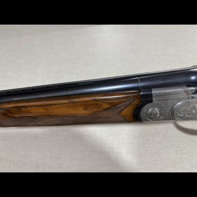 Arma de fogo cega com madeira e metal gravado