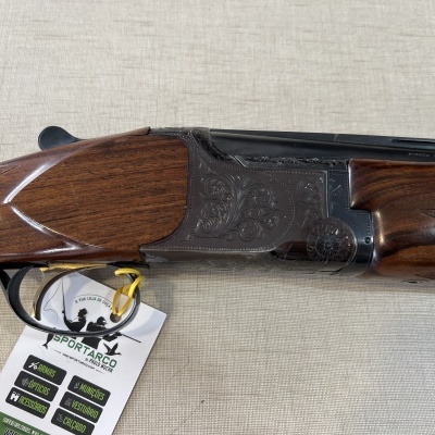 Espingarda de caça em madeira e metal com etiqueta SPORTARCO