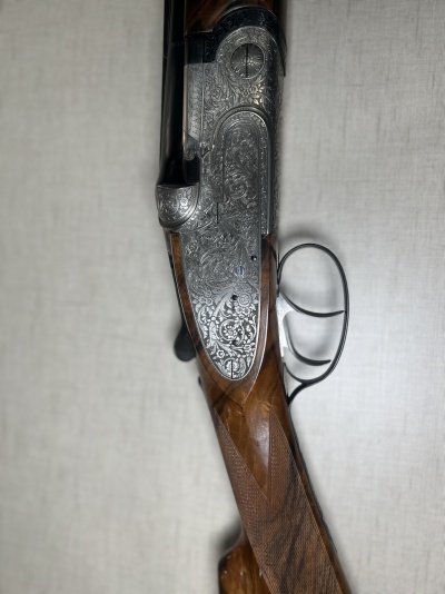 Espingarda em madeira e metal com gravações