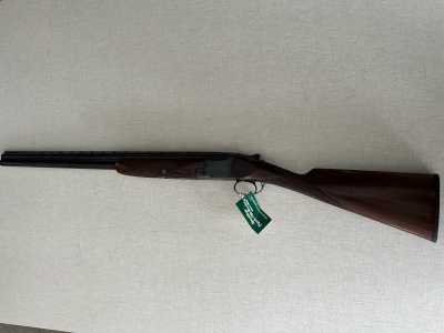 espingarda de canos paralelos com coronha de madeira